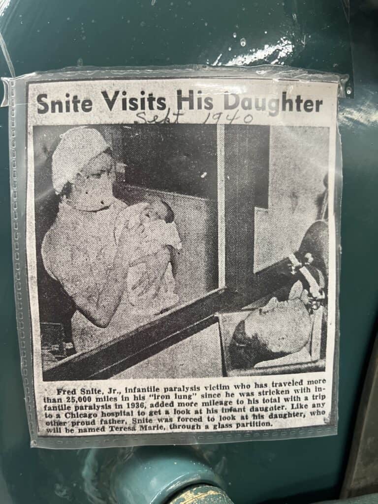 newspaper article of man who lived in an iron lung