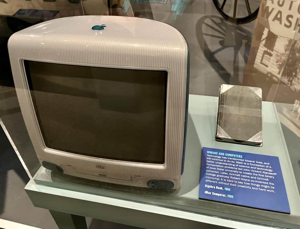 1998 iMac computer and an 1866 algebra book