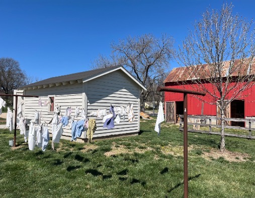 barn with clothes hanging on clothesline