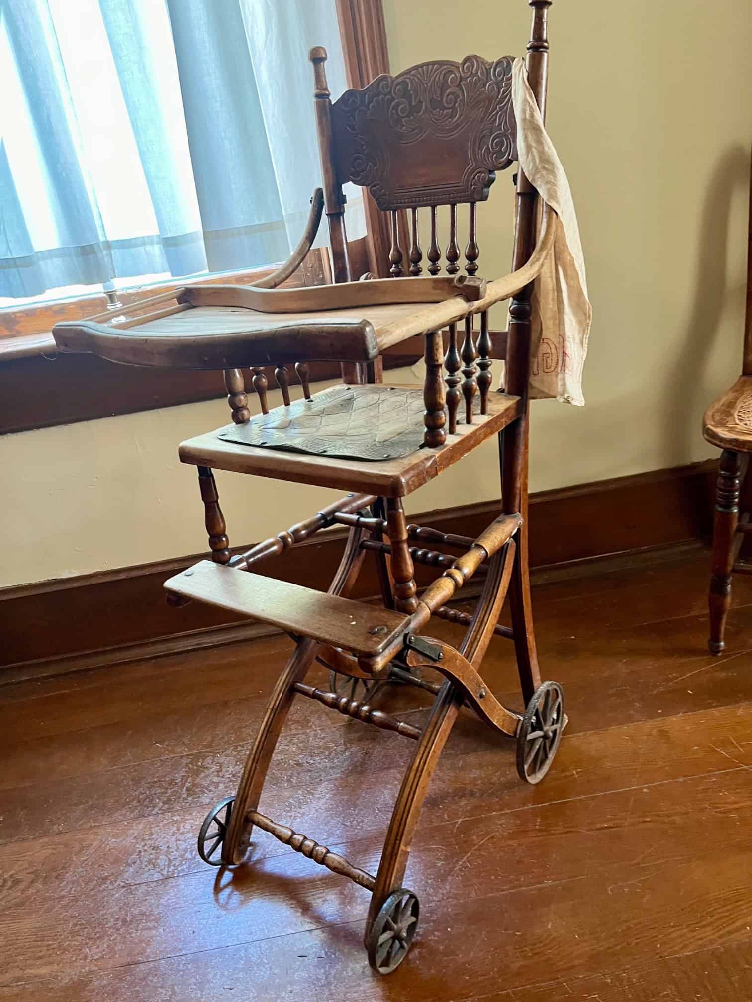 historic wheel chair on wheels